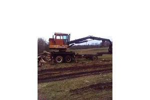 Precision Husky 235  Log Loader