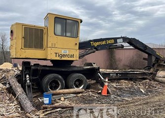 Tigercat 240B  w/ Slasher Saw Log Loader
